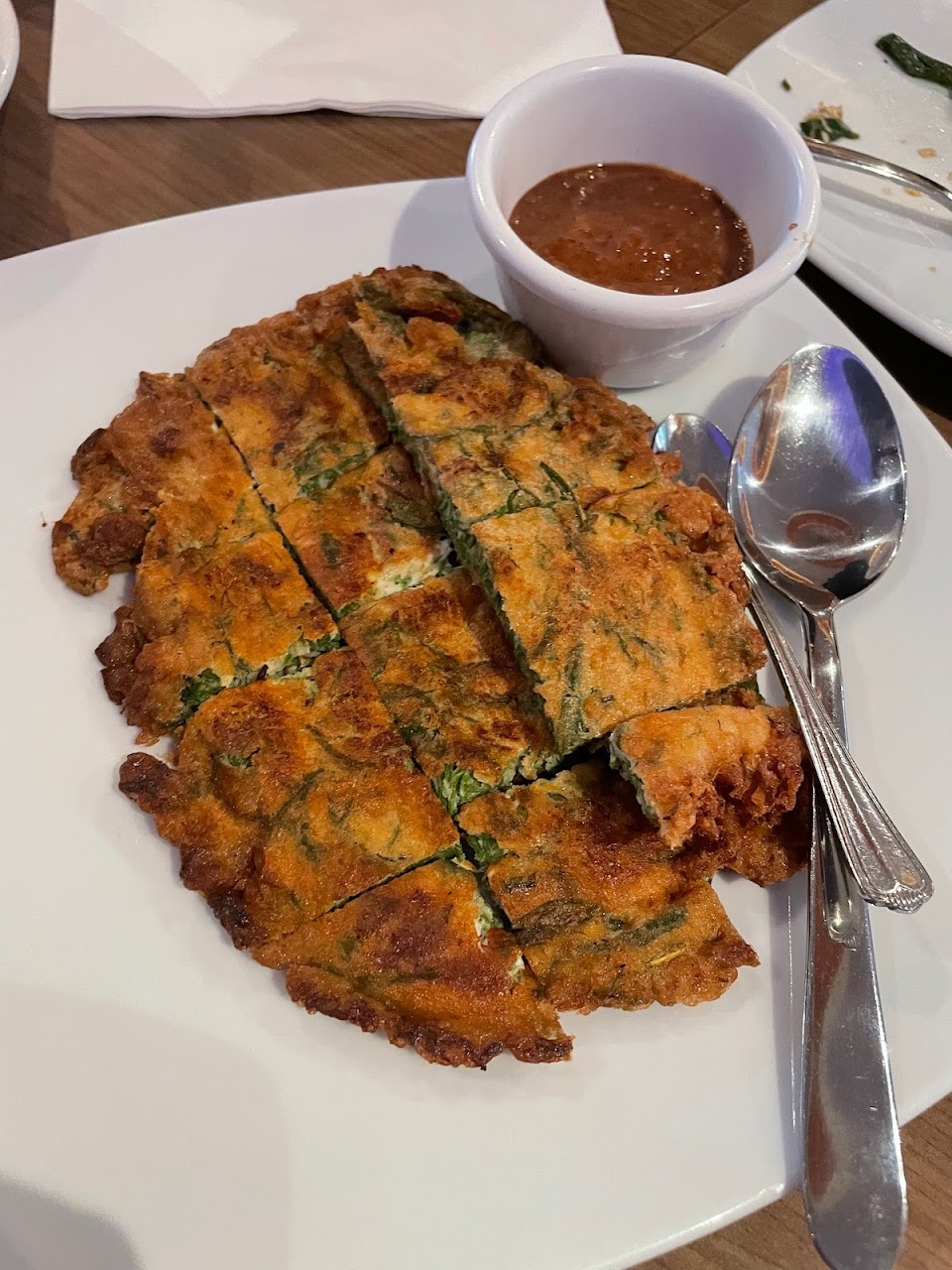 Thai omelette dish with sauce at Caysorn Thai